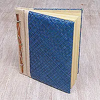 Happy Weaver in BlueArtisan Hand-woven Pandan Leaf Journal in Blue from Bali Shop Now
