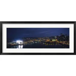 High angle view of buildings lit up at night, Heinz Field, Pittsburgh, Allegheny county, Pennsylvania, USAby Panoramic Images Hassle-Free Returns